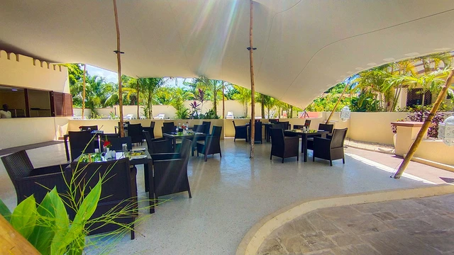 Golden Palm Boutique Zanzibar · 餐厅与用餐环境