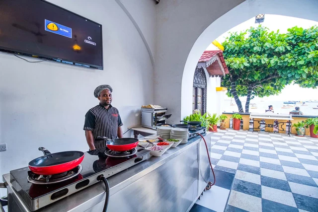 Tembo Hotel · 餐厅与用餐环境